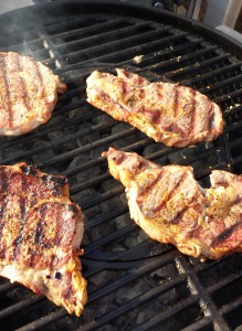 Hot juicy rib-eye steaks in the making!